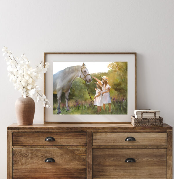 Framed painting of two girls in nature with a white horse