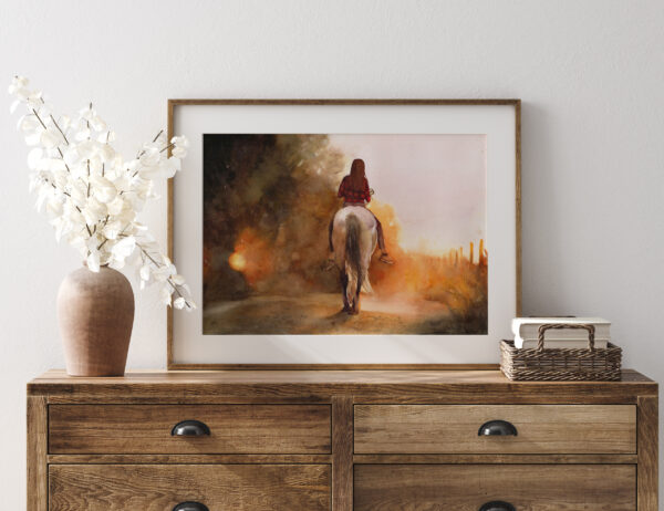 horse in sunset print framed in a brown oak frame