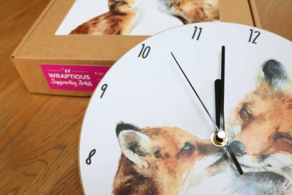 fox kiss clock close up
