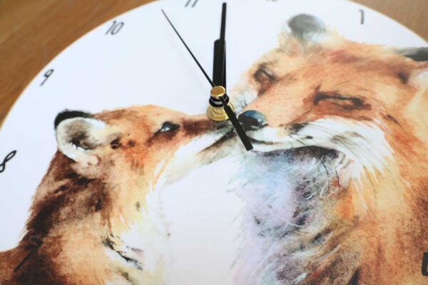 fox kiss clock close up